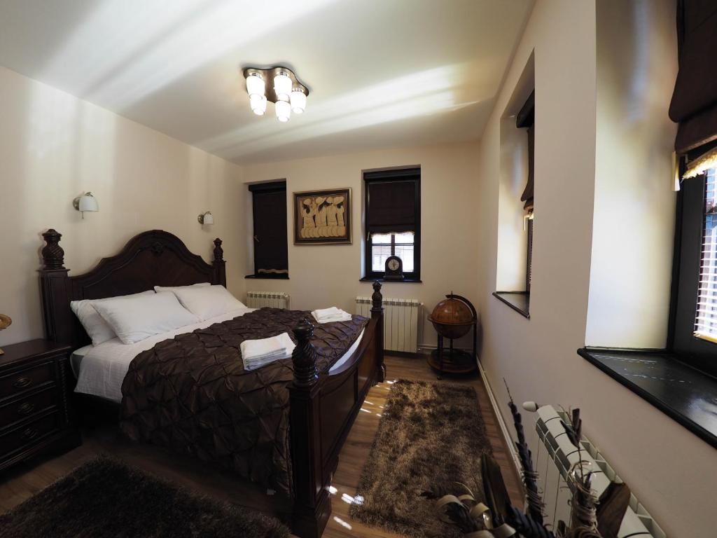 Postel nebo postele na pokoji v ubytování Guest house DON-lux