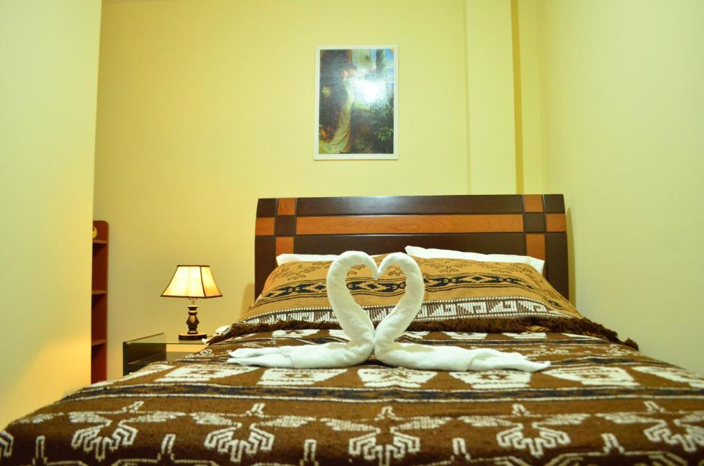 Postel nebo postele na pokoji v ubytování Rosenverg B&B Tours
