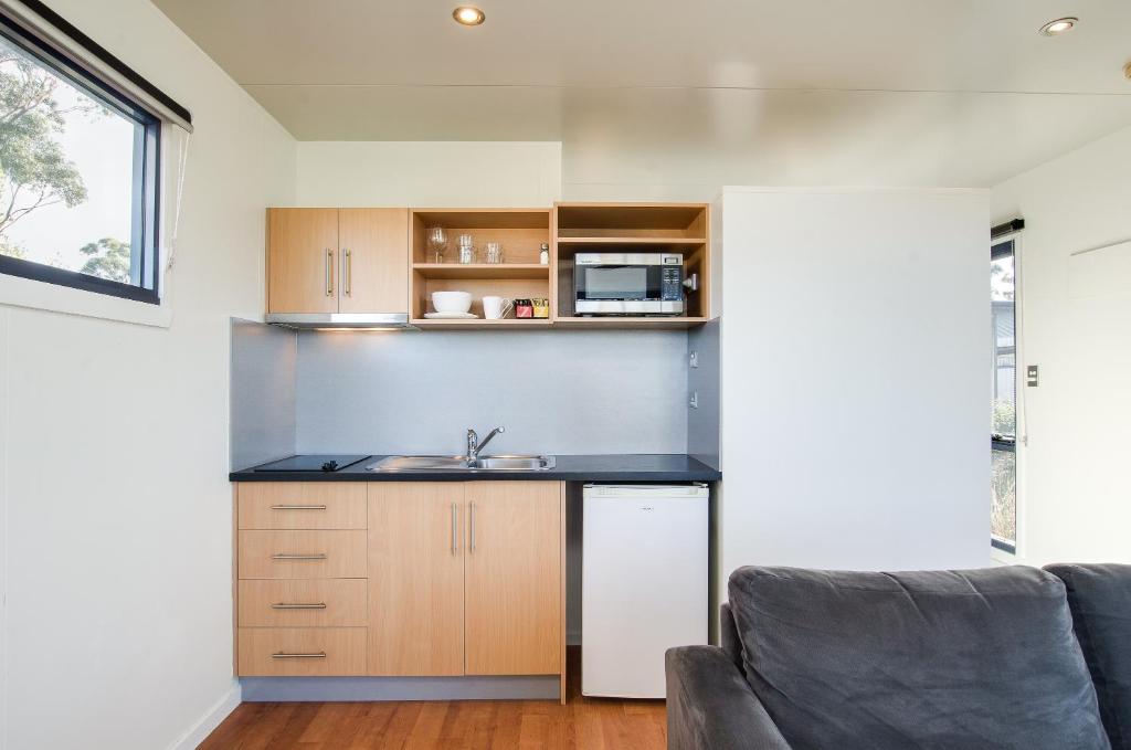 Kuchyň nebo kuchyňský kout v ubytování Swansea Beach Chalets