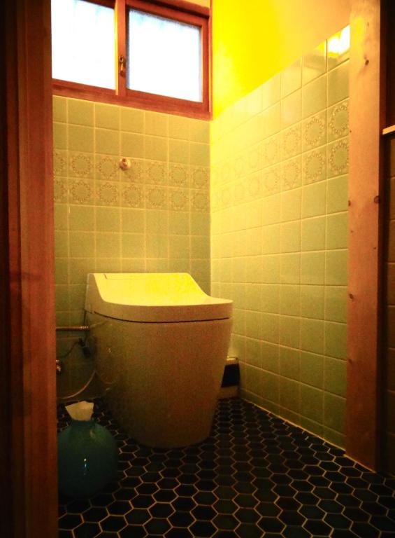 Koupelna v ubytování Guest House Toranjyo-lit
