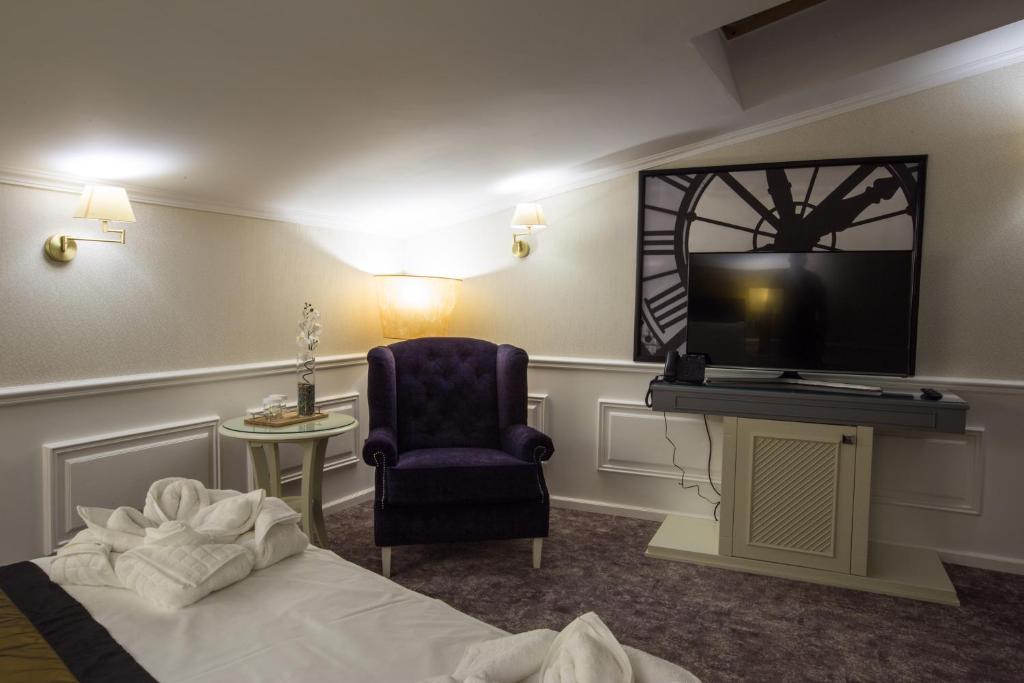 Posezení v ubytování Peninsula Boutique Hotel