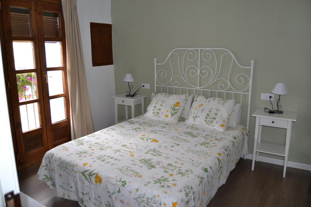 Postel nebo postele na pokoji v ubytování Casa Perarruga