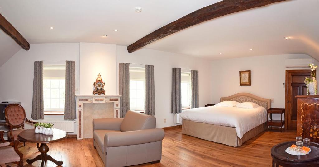 Postel nebo postele na pokoji v ubytování B&B Domein Rodin