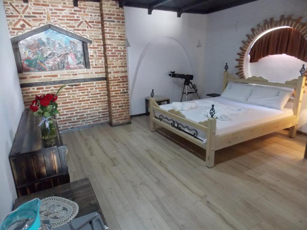 Postel nebo postele na pokoji v ubytování Sunset Suites