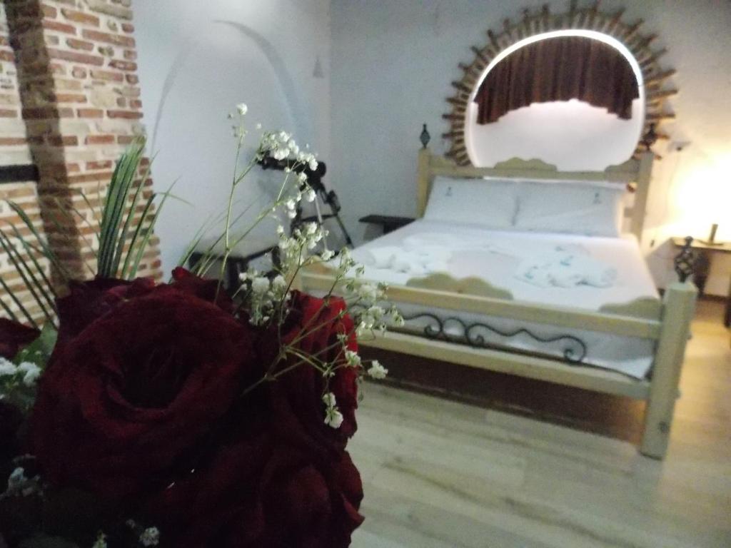 Postel nebo postele na pokoji v ubytování Sunset Suites