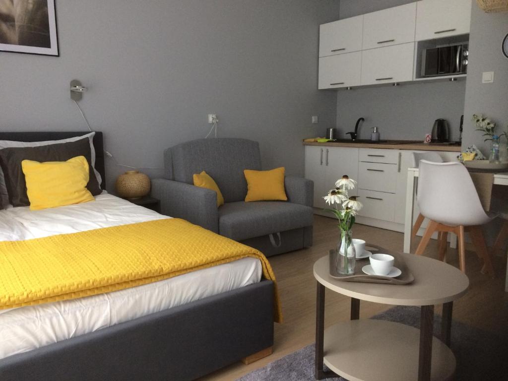 Posteľ alebo postele v izbe v ubytovaní Apartament Nowa Motława & SPA