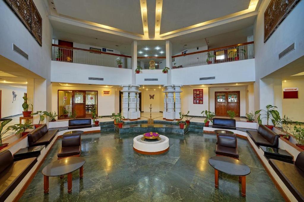 Posezení v ubytování Ramee Guestline Tirupati
