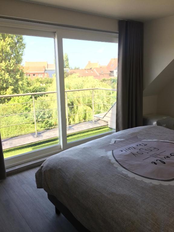 Postel nebo postele na pokoji v ubytování B&B Intermezzo
