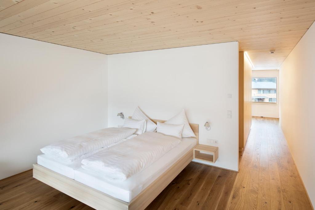 Postel nebo postele na pokoji v ubytování Hotel Tannahof