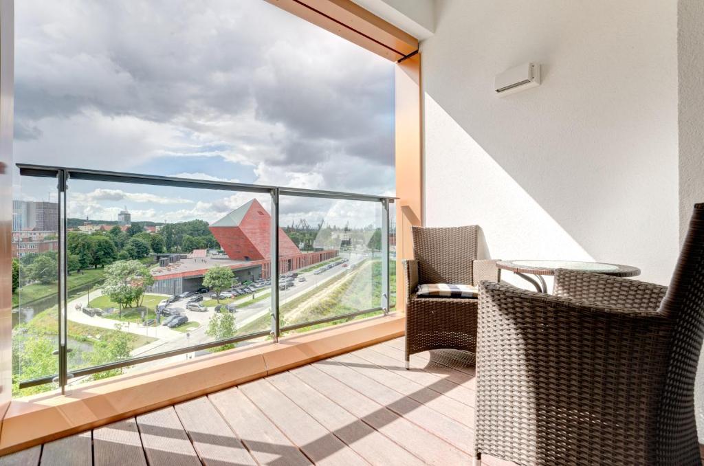 Posedenie v ubytovaní Apartments Brabank Old Town & by Noclegi Renters