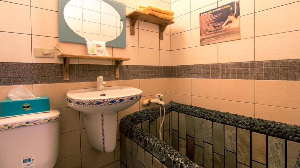Koupelna v ubytování Shankou Hotspring Hotel