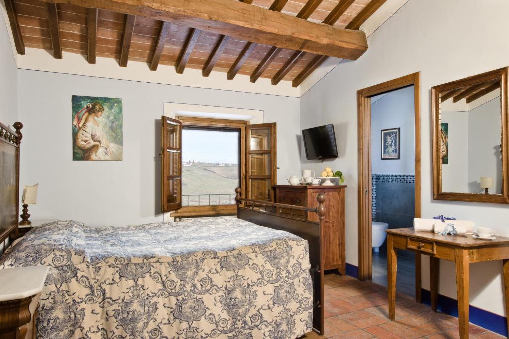 Postel nebo postele na pokoji v ubytování Poderi Arcangelo