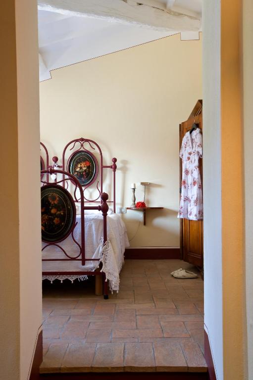 Postel nebo postele na pokoji v ubytování Poderi Arcangelo