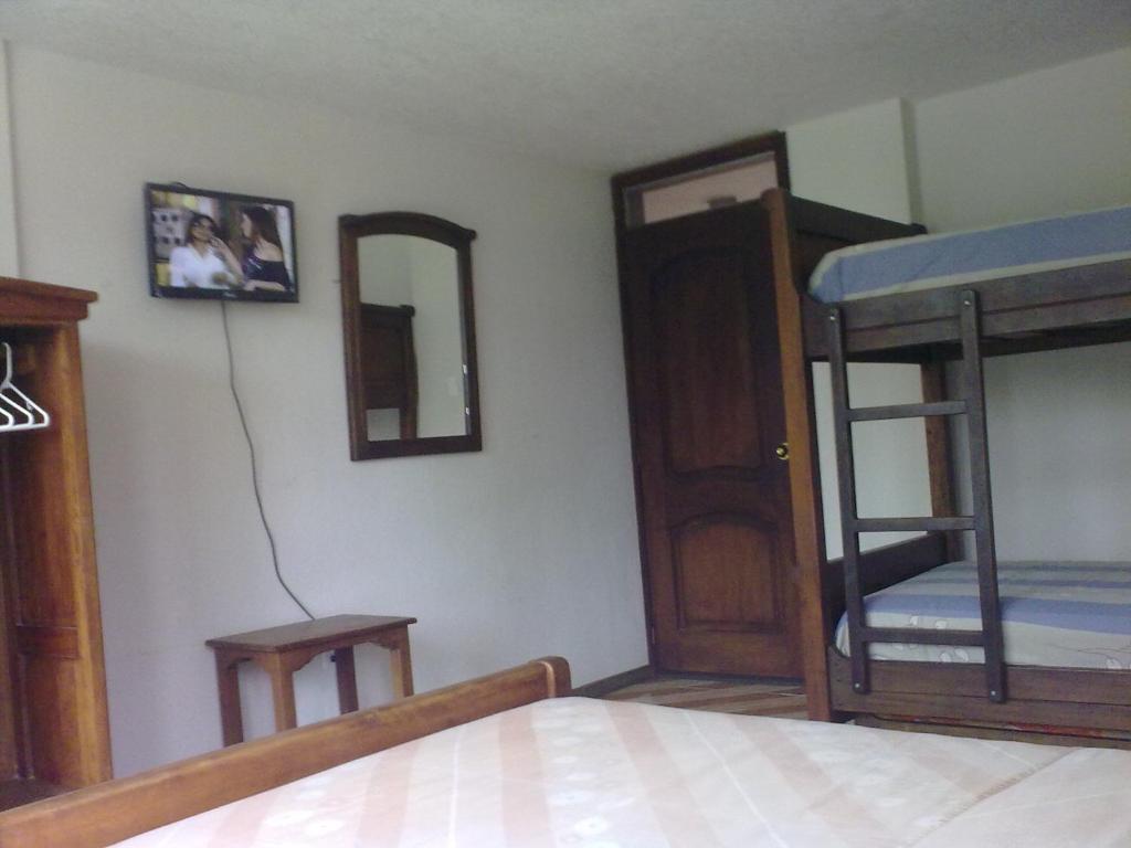 Postel nebo postele na pokoji v ubytování Hotel Kemarios