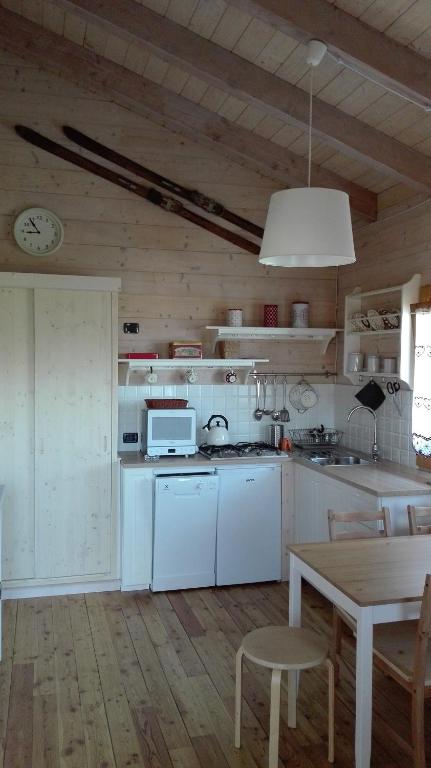 Kuchyň nebo kuchyňský kout v ubytování Chalet D'Antan