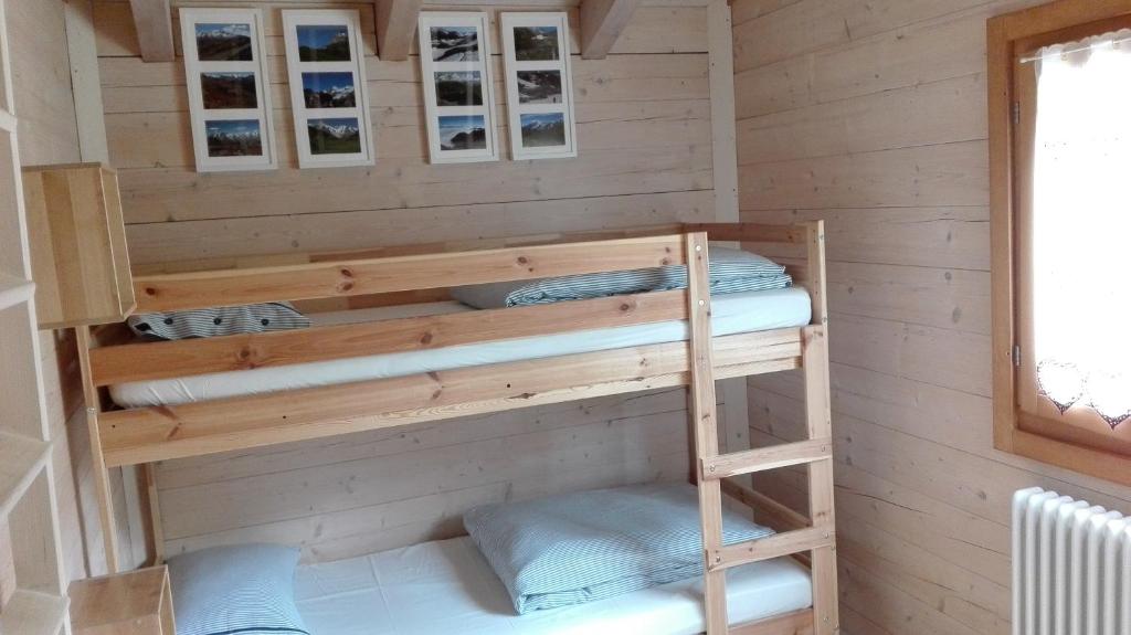 Palanda nebo palandy na pokoji v ubytování Chalet D'Antan