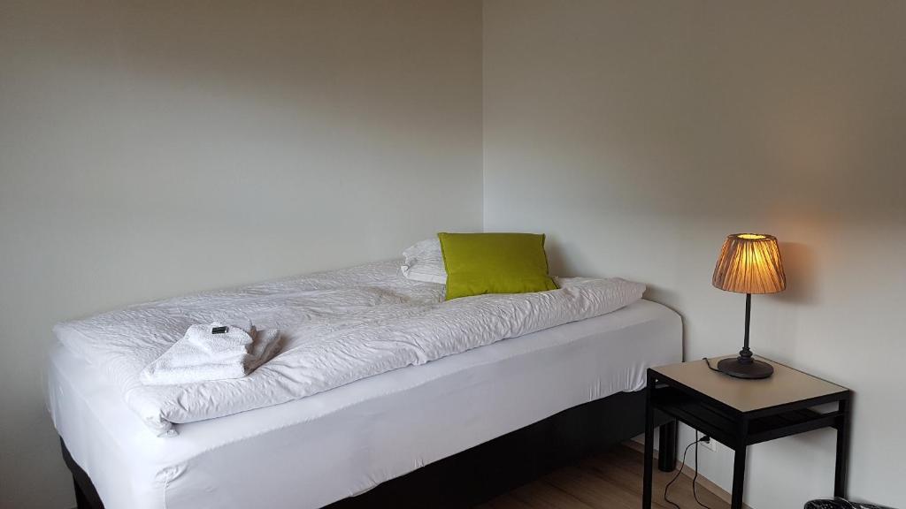 Postel nebo postele na pokoji v ubytování Harbour Inn - Guesthouse