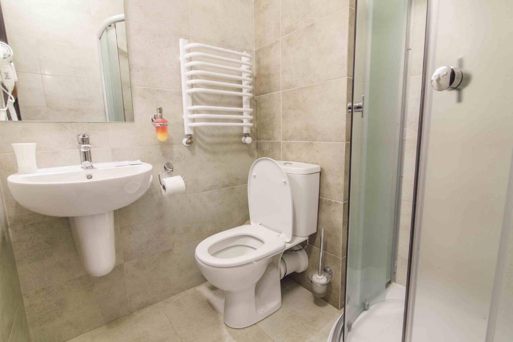 Koupelna v ubytování Zinedine Sport-Hotel