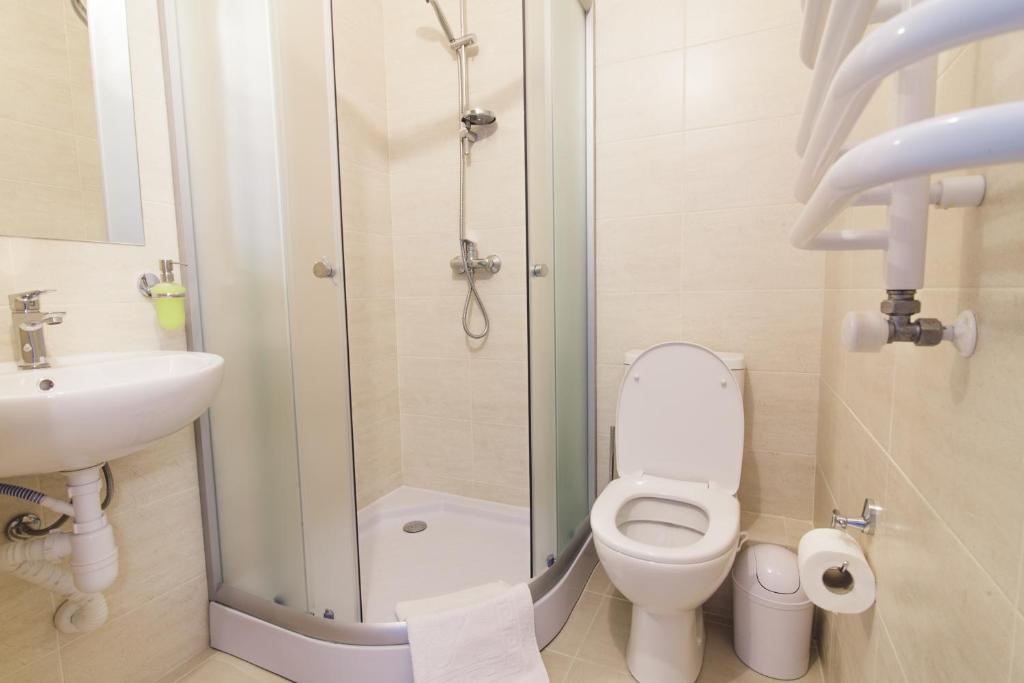 Koupelna v ubytování Zinedine Sport-Hotel
