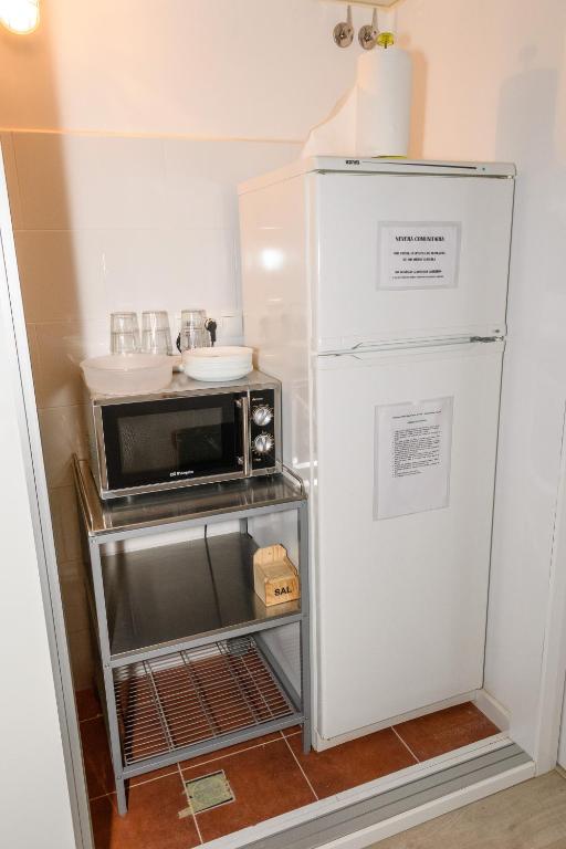 Kuchyň nebo kuchyňský kout v ubytování Albergue Valderrobres Auto check-in