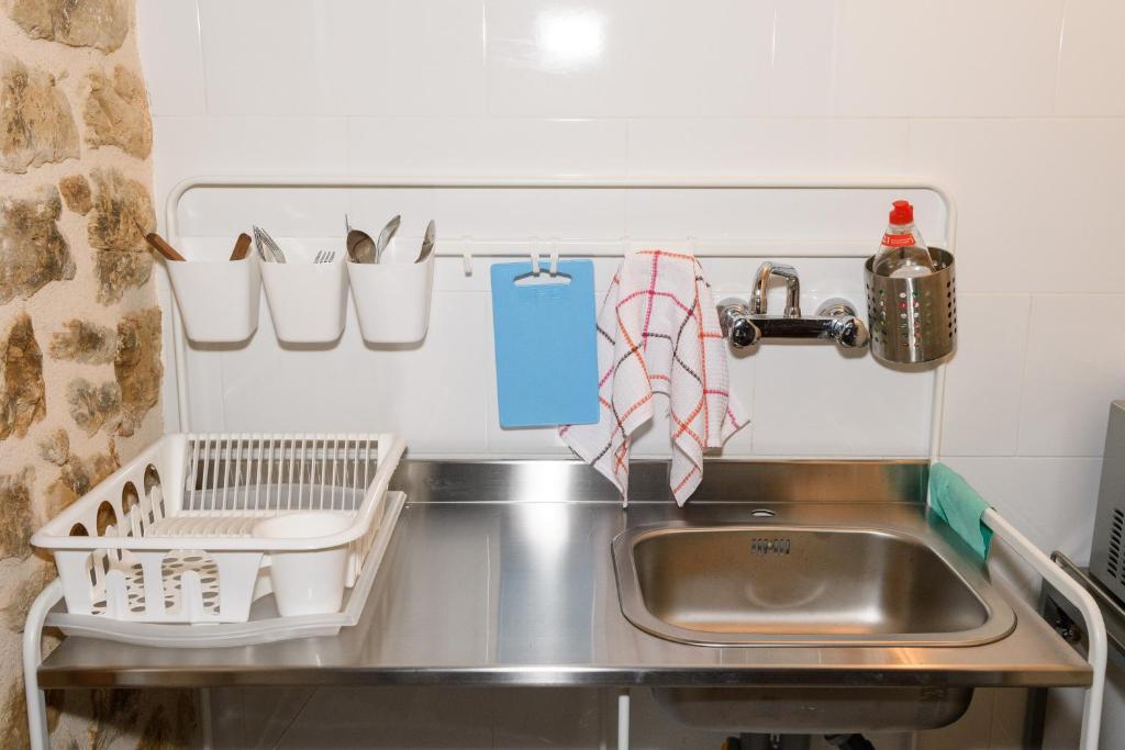 Kuchyň nebo kuchyňský kout v ubytování Albergue Valderrobres Auto check-in