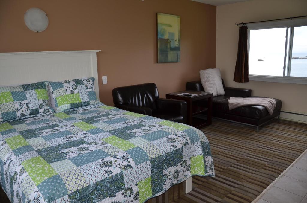 Postel nebo postele na pokoji v ubytování Clifty Cove Motel