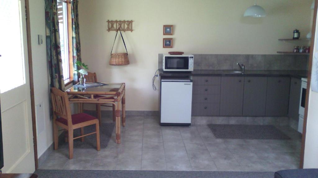 Kuchyň nebo kuchyňský kout v ubytování Creel Lodge