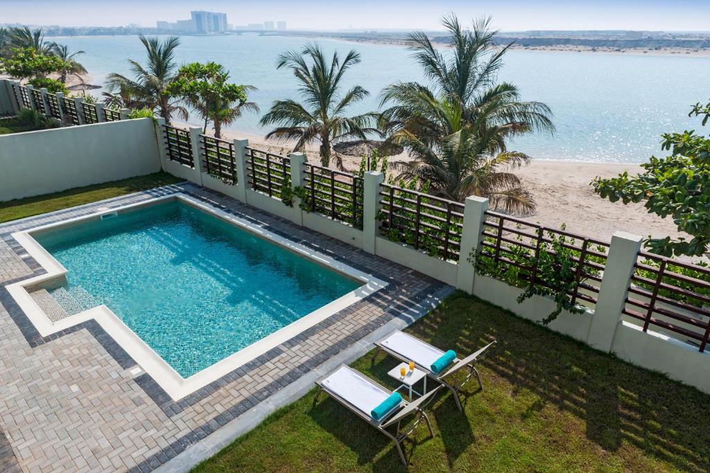 Bazén v ubytování Jannah Hotel Apartments & Villas nebo v jeho okolí