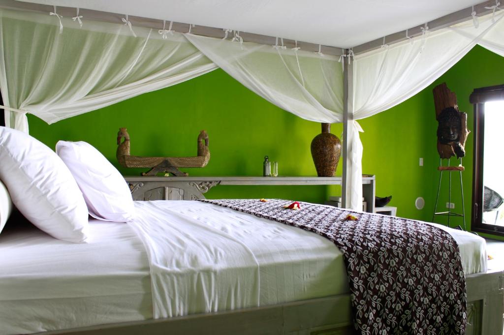 Postel nebo postele na pokoji v ubytování Zen Resort Bali