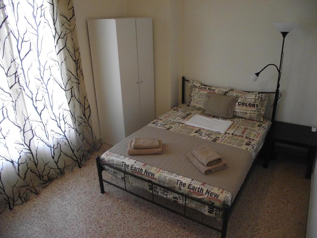 Posteľ alebo postele v izbe v ubytovaní Sfiggos 54 Guest House