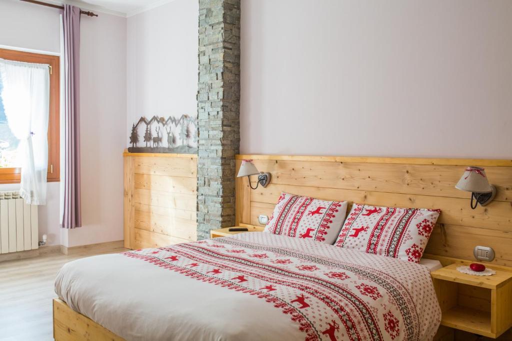 Postel nebo postele na pokoji v ubytování Albergo Rotenthal