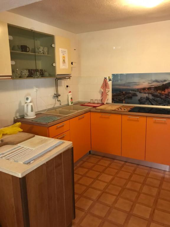 Kuchyň nebo kuchyňský kout v ubytování Room sea view n°1