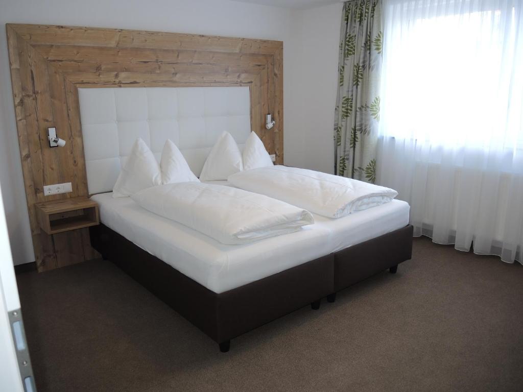 Voodi või voodid majutusasutuse Hotel Berghof toas