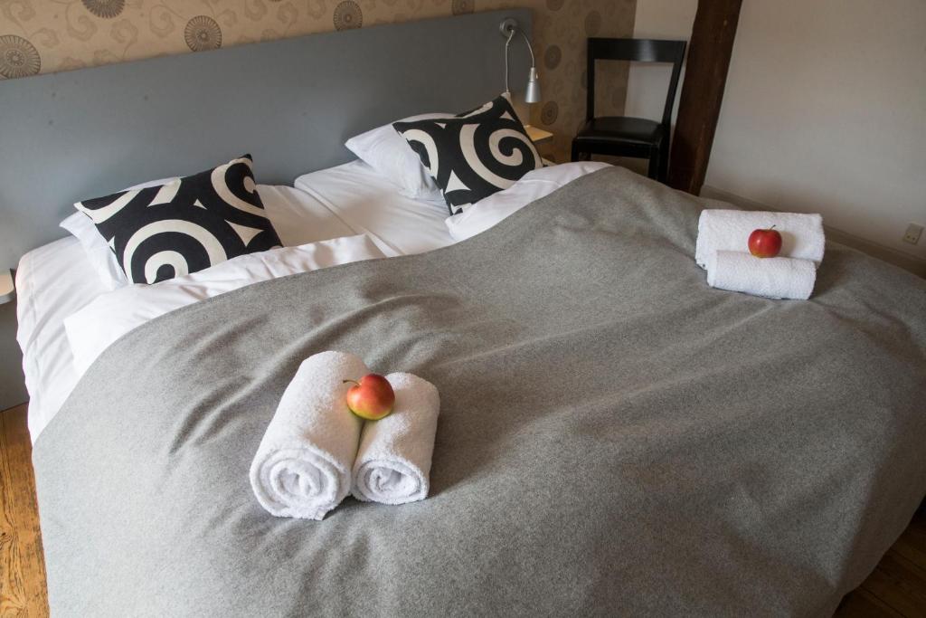 Postel nebo postele na pokoji v ubytování Hotel Saxkjøbing