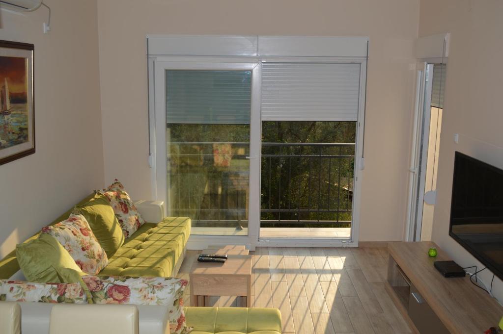 TV a/nebo společenská místnost v ubytování Apartments MM