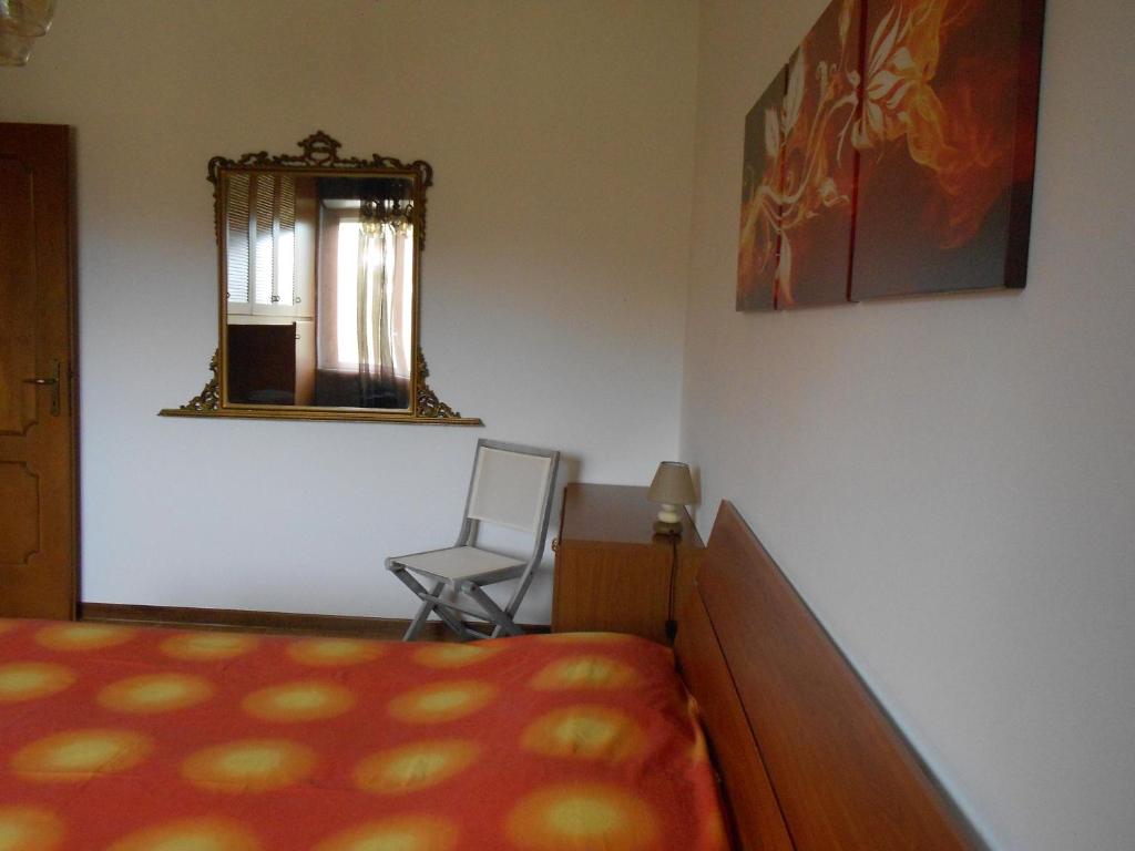 Posteľ alebo postele v izbe v ubytovaní Casa Emilia Loano