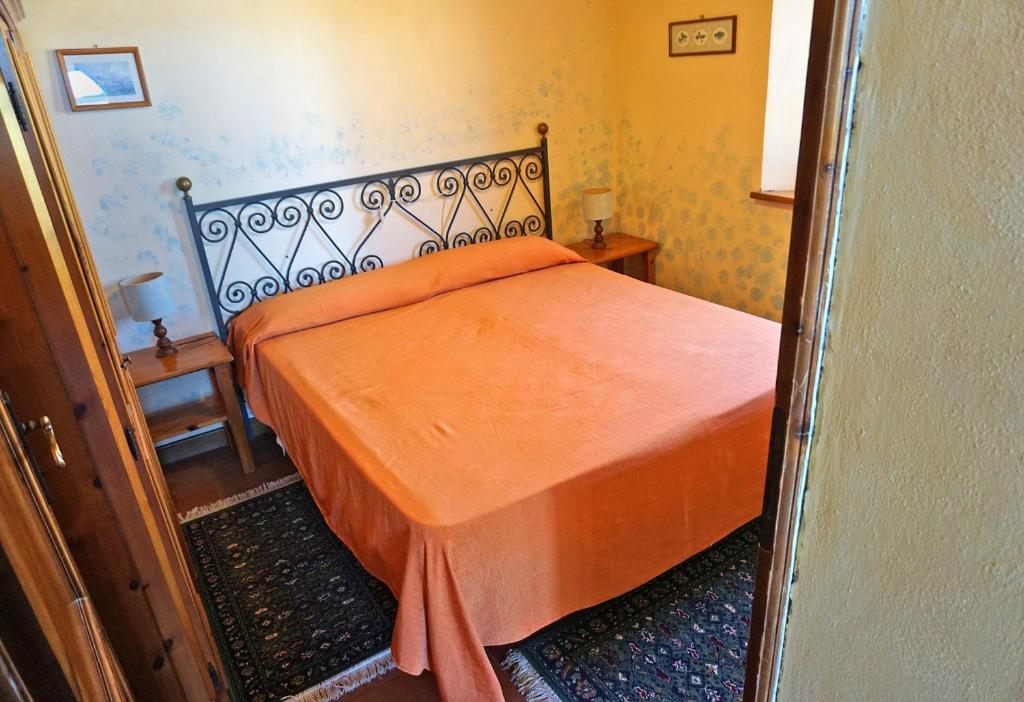 Postel nebo postele na pokoji v ubytování Castello di Selvole