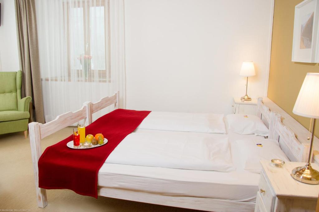 Postel nebo postele na pokoji v ubytování Hotel Veduta
