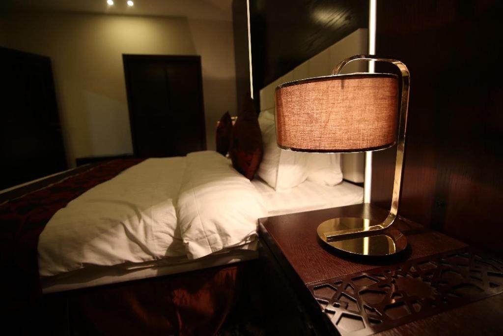 Postel nebo postele na pokoji v ubytování Elaf Aparthotel