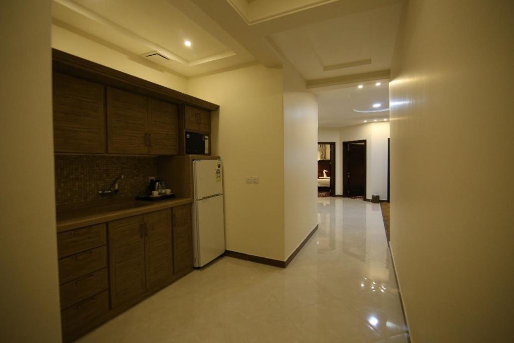 Kuchyň nebo kuchyňský kout v ubytování Elaf Aparthotel