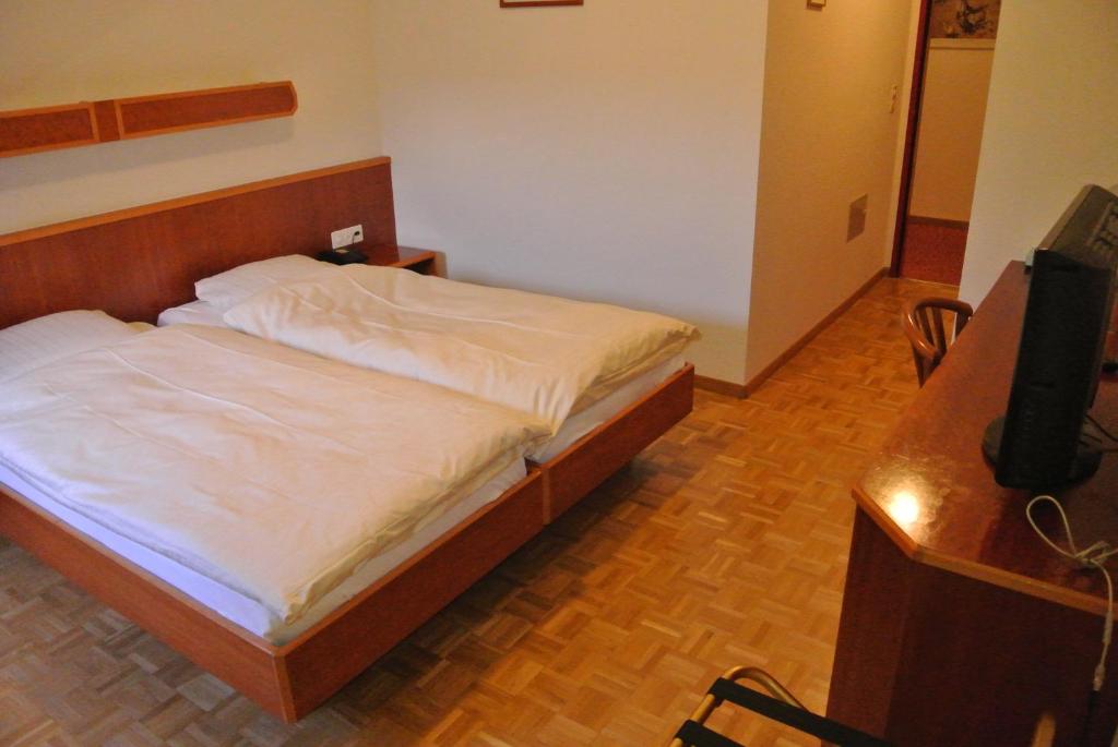 Postel nebo postele na pokoji v ubytování Auberge de la Réunion