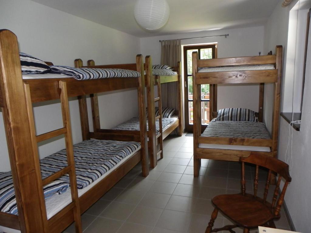 Postel nebo postele na pokoji v ubytování The Millhouse Bled