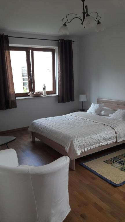 Posteľ alebo postele v izbe v ubytovaní Gdynia Orlowo Honey Apartment