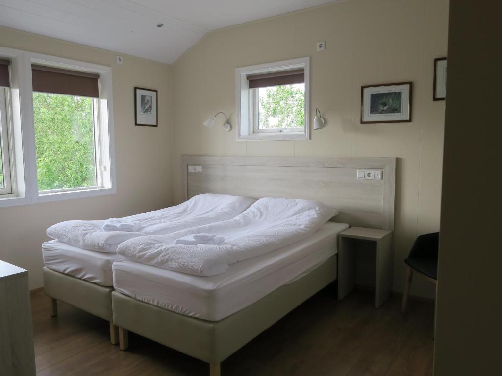 Postel nebo postele na pokoji v ubytování Dilksnes Guesthouse
