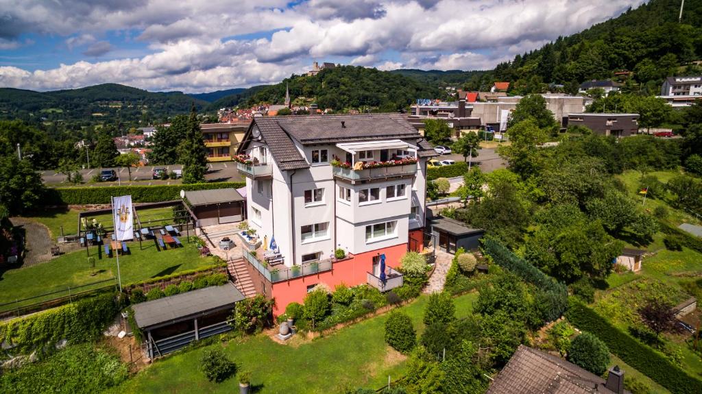 an aerial view of a large house on a hill at Pension Margarethe in Biedenkopf