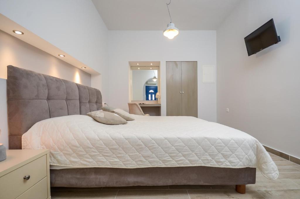 Postel nebo postele na pokoji v ubytování Filippa Studios