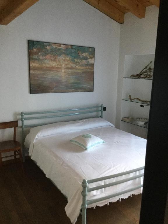 Postel nebo postele na pokoji v ubytování Appartamento Terrazza sul Porto