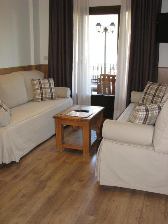 Posezení v ubytování Aparthotel Sarrato