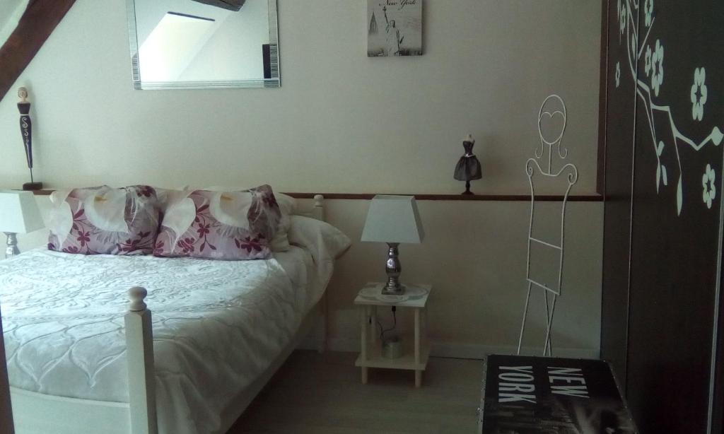 Postel nebo postele na pokoji v ubytování Fleur De Soleil