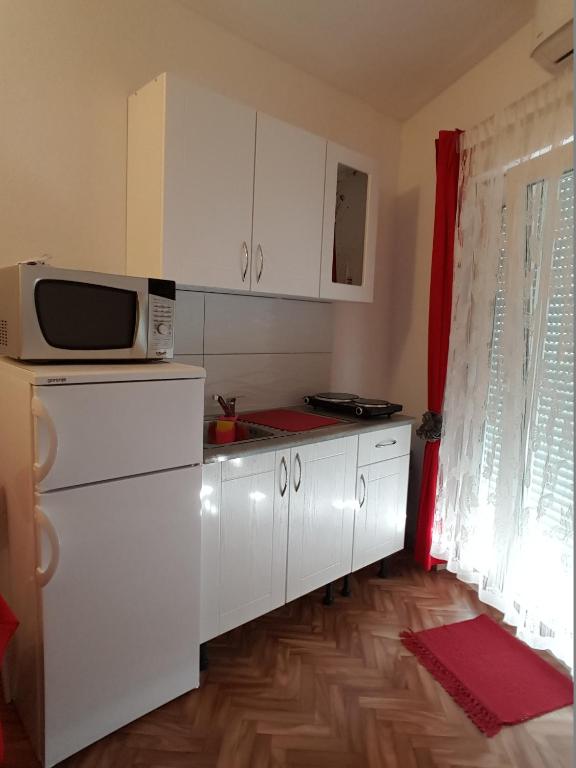 Kuchyňa alebo kuchynka v ubytovaní Apartments Megi